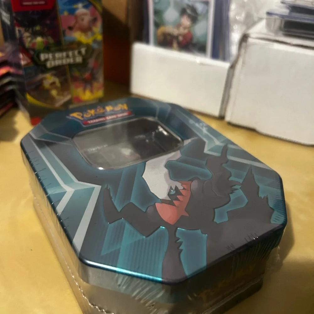 Pokemon Darkrai Teal Blue Tin with 3 booster pack within